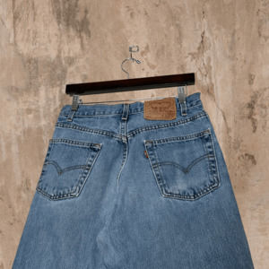 Vintage Levis 550 Relaxed Fit Jeans Light Wash Paper Tag Red Tab Made in USA 90s